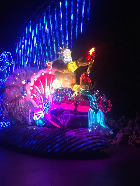 Disneyland's Paint the Night Parade with seating guide and viewing tips. 