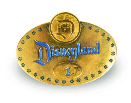 https://thehappiestblogonearth.com/wp-content/uploads/2022/11/%EF%82%A7Disneyland-Employee-Badge-1-1955-issued-to-Walt-Disney-%C2%A9Disney-500x393.jpg